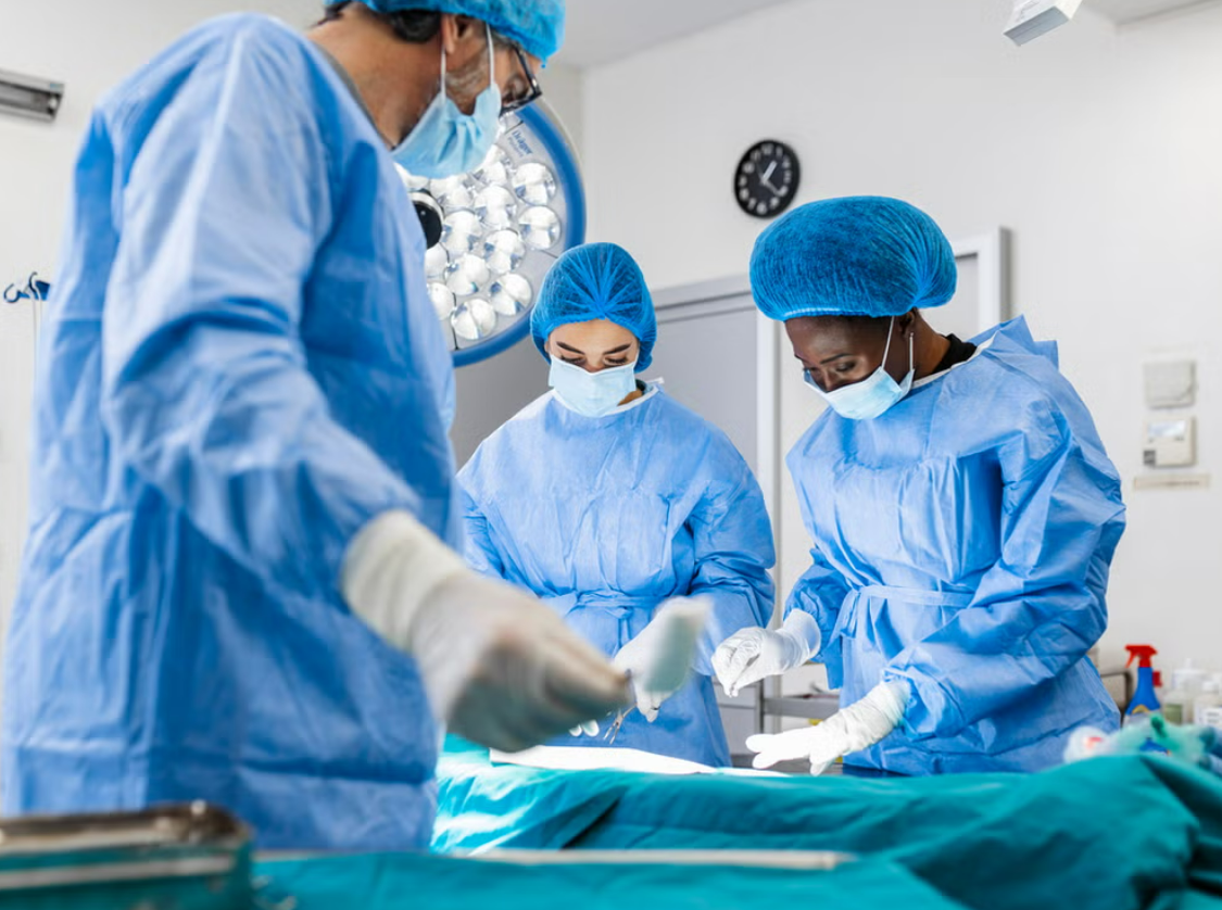 Surgical team performing a liver operation in a modern operating theatre