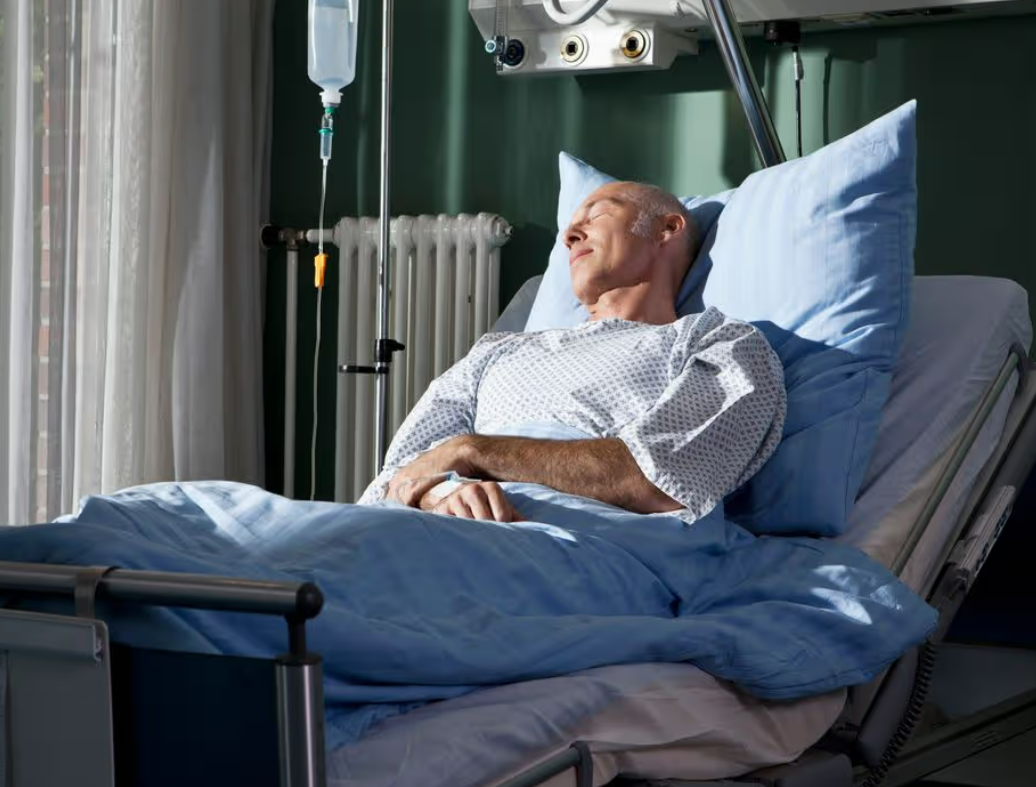 Patient recovering under monitoring after liver transplant surgery